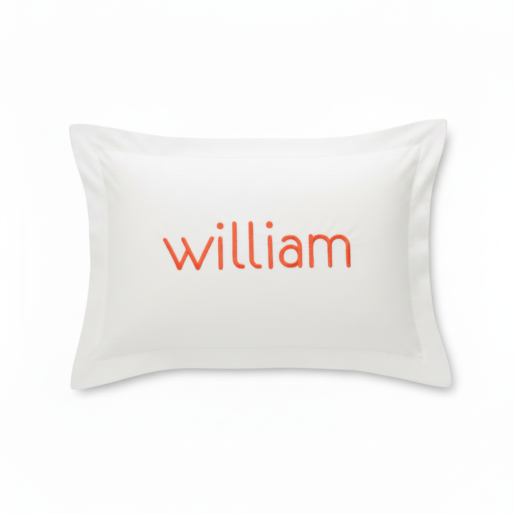 A white rectangular pillow sham featuring the name 'william' printed in orange lowercase letters across the center, shown against a plain white background.