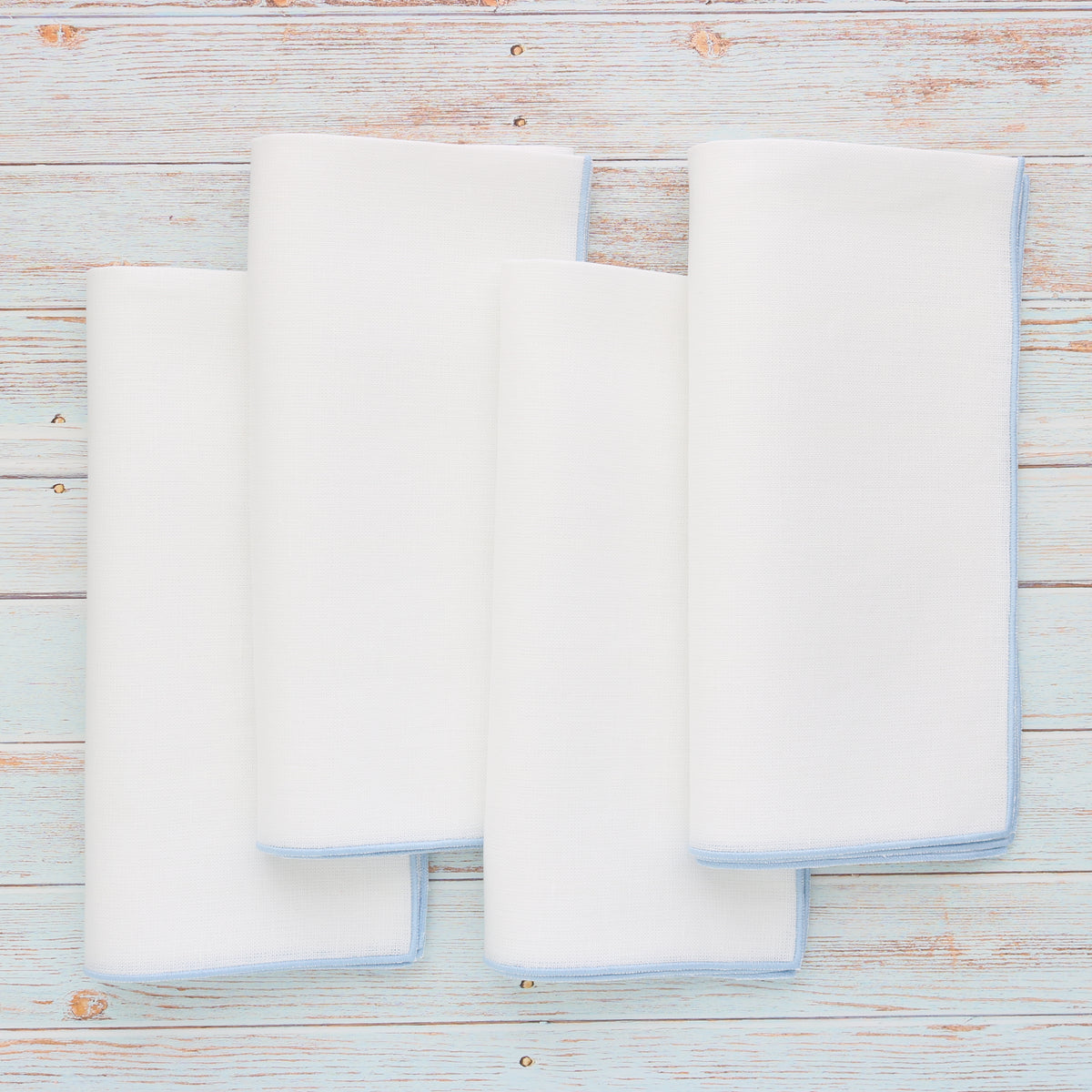 White Turin Linen Dinner Napkins with Light Blue Edge (each)