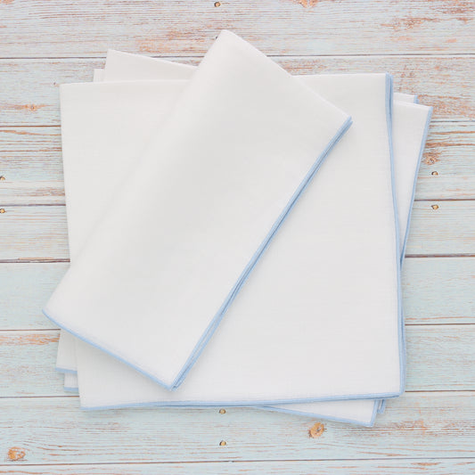 White Linen Dinner Napkins with Light Blue Edge (each)