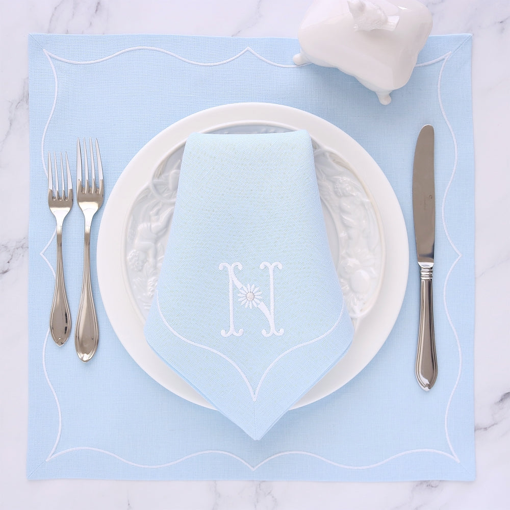 baby blue gabriella napkin and placemat with white embroidered border