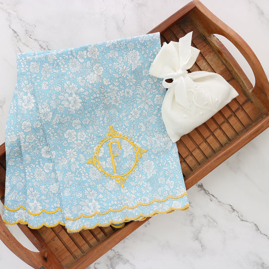 liberty london emily belle blue sky guest towels with Aurora doble scallop border in yellow and monogram Savanna F