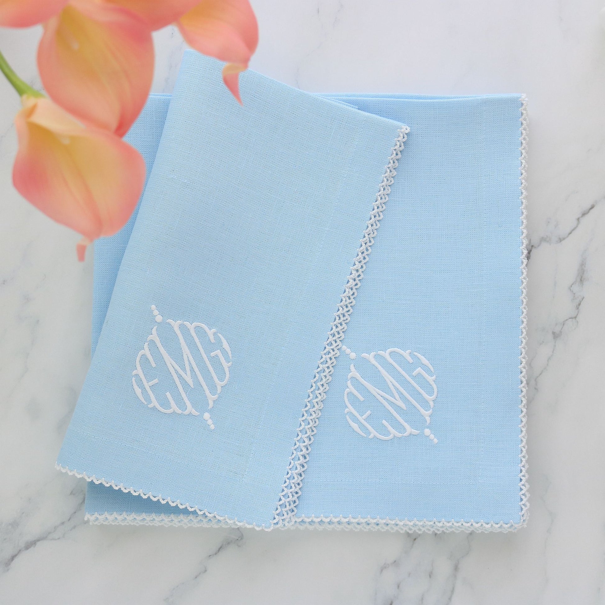 Baby blue linen dinner napkins with picot tirm and monogram