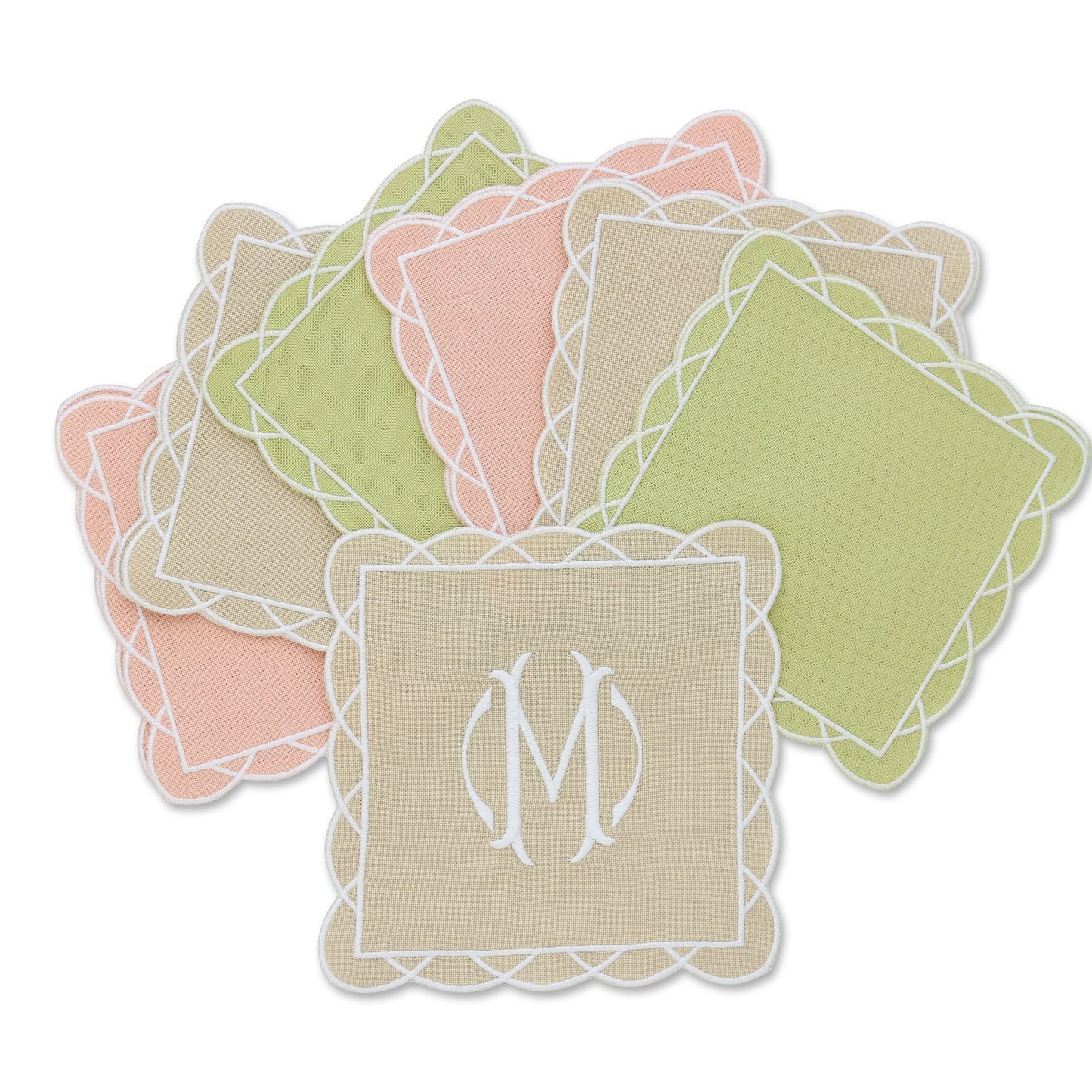 set of Daisy cocktail napkins in various colors and cream embroidered edges, monogram M