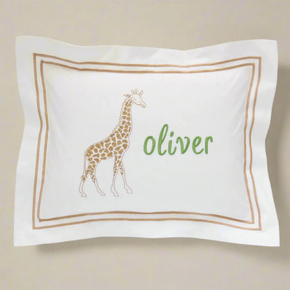 White pillowcase with double border with a giraffe embroidery and name Oliver