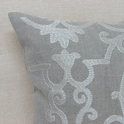 Natural linen pillow with scroll pattern