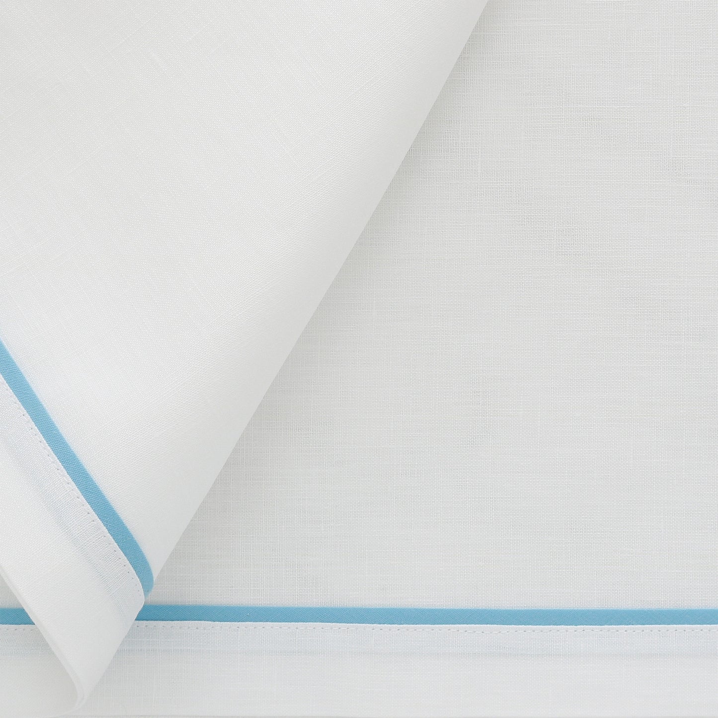 white napkins with cloud blue inset tape