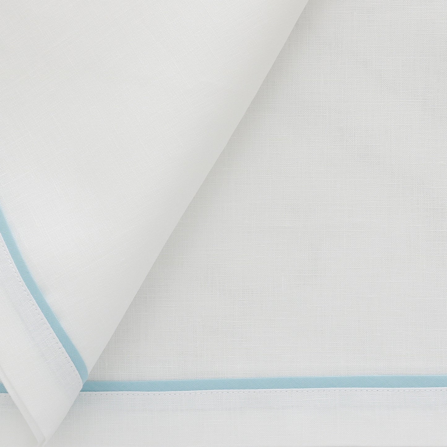 white napkins with azure inset tape