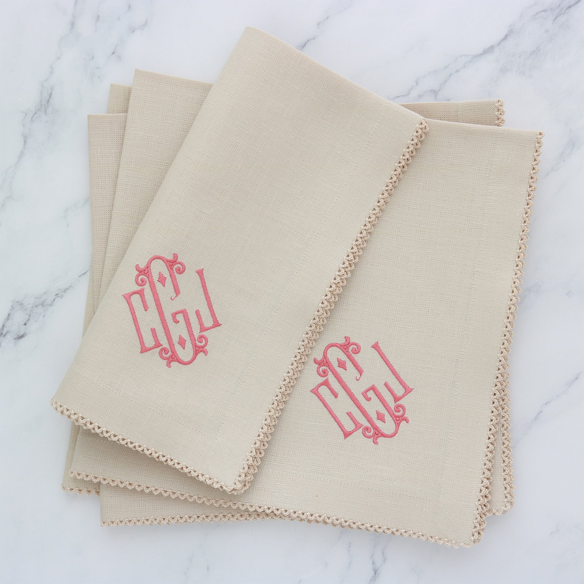 set of 4 tan linen dinner napkins with natural picot trim and monogram CGJ in dusty rose