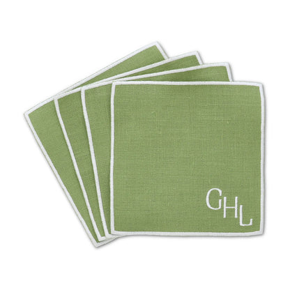 autumn green straight edge Turin cocktail napkin set of 4, arranged in an overlapping fan pattern, monogram GHL in the bottom right corner, handmade by Cora's Linen