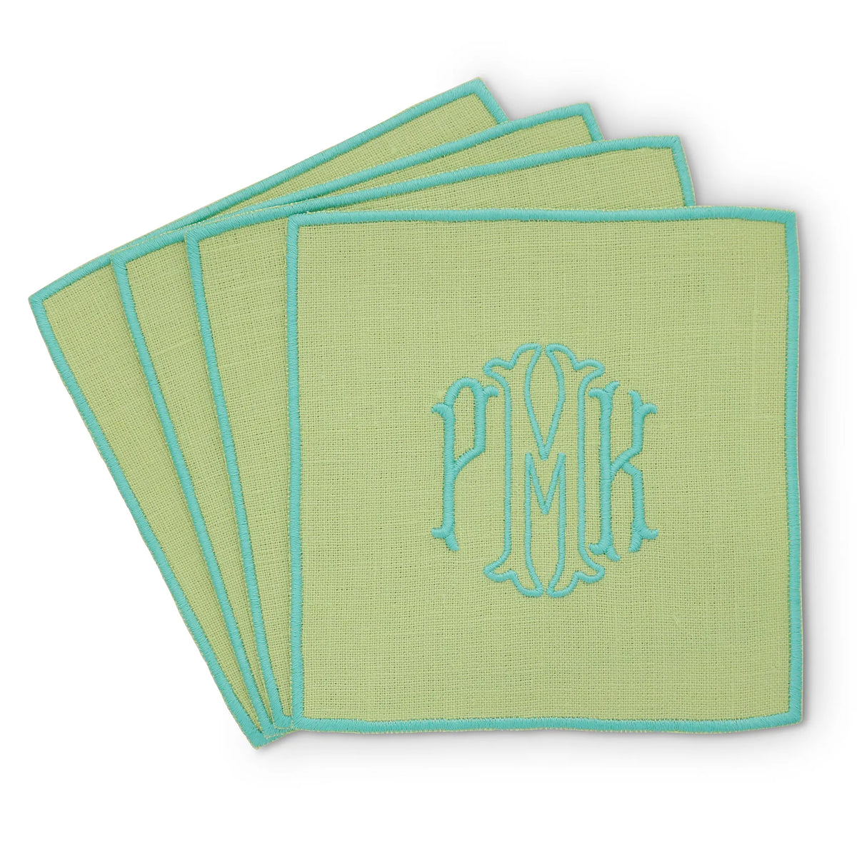 avocado green straight edge Turin cocktail napkin set of 4, arranged in an overlapping fan pattern with monogram PMK, handmade by Cora's Linen