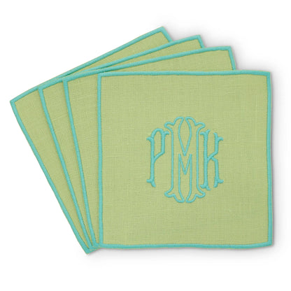 avocado green straight edge Turin cocktail napkin set of 4, arranged in an overlapping fan pattern with monogram PMK, handmade by Cora's Linen