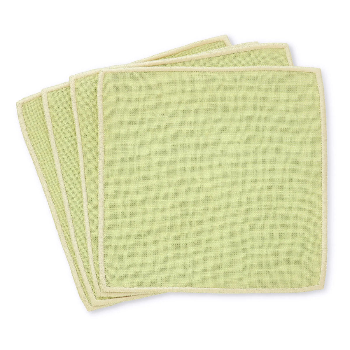 green straight edge Turin cocktail napkin set of 4, arranged in an overlapping fan pattern, handmade by Cora's Linen