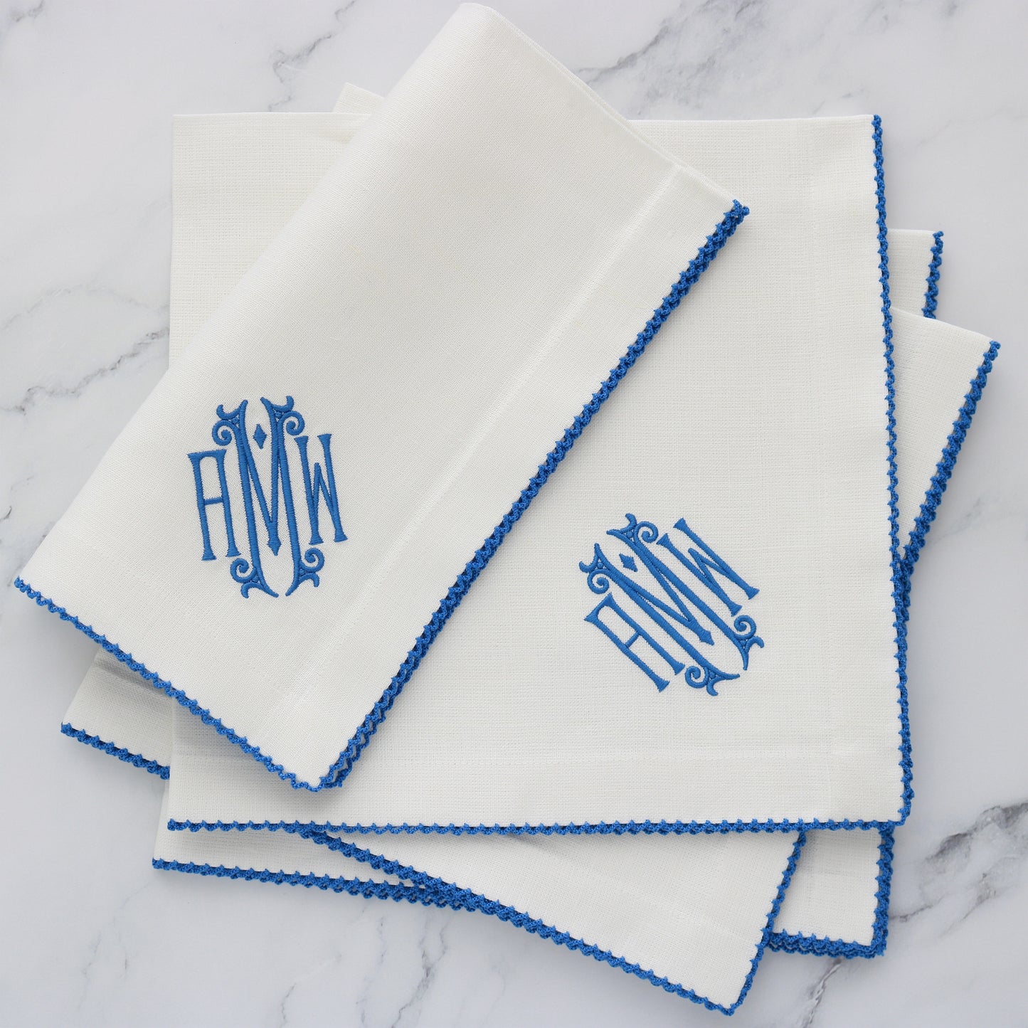 set of 4 White napkins with Pacific Blue picot trim and matching monogram AMW