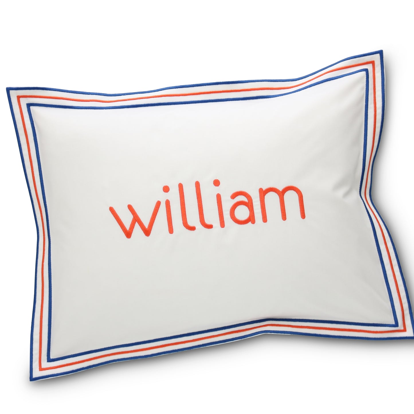 percale boudoir sham with 3 lines border in Navy and Hot Orange and embroidered name William