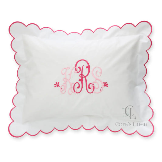White pillow with hot pink scalloped edge and monogram KRS handmade by Cora's Linen