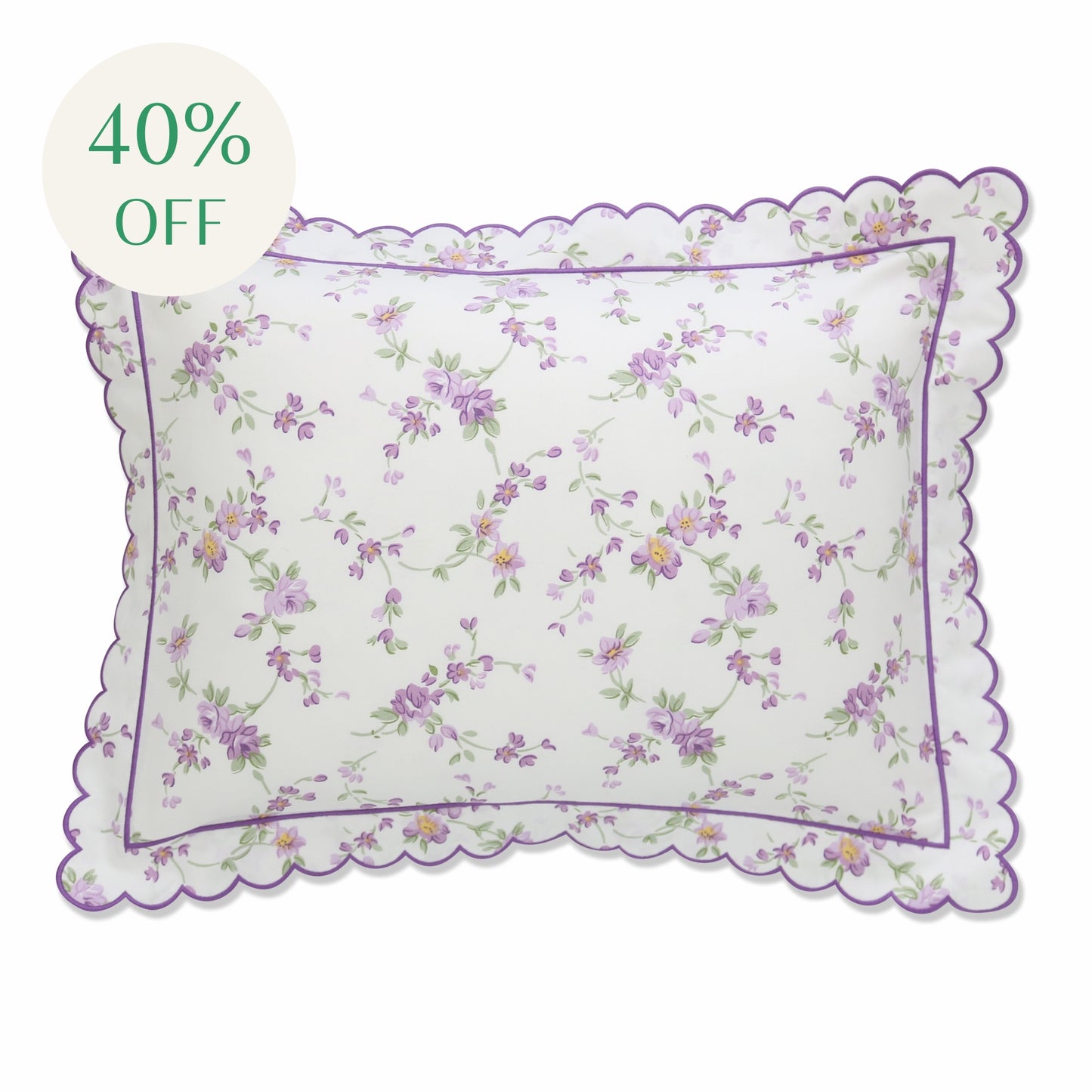 A scalloped boudoir sham with a floral print featuring purple flowers and a scalloped purple edge.