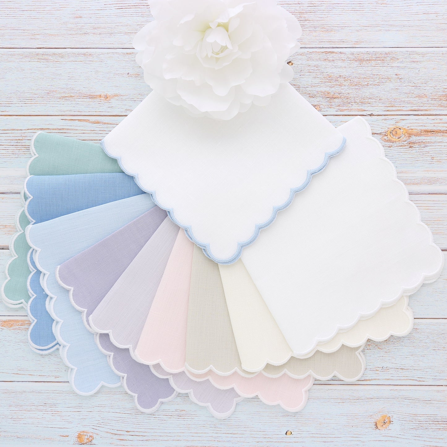 Various colorful linen handkerchief with White scallops