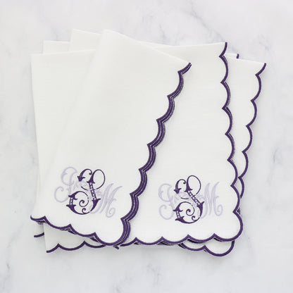 set of 4 white napkins with purple scallops and monogram ISM